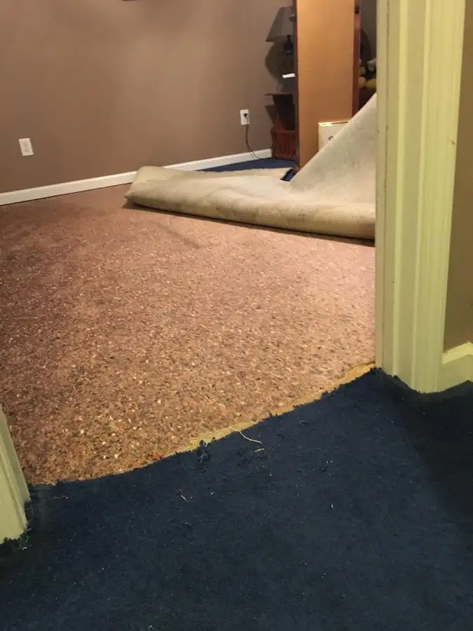 Carpet pad removal revealing water damage during Drying & Dehumidification in Halfmoon